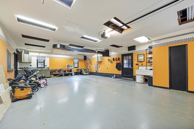 7308 W Lancaster Rd, Peoria, IL 61607 - garage featuring a garage door opener