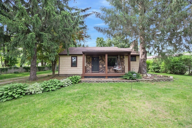 7308 W Lancaster Rd, Peoria, IL 61607 - ranch-style home featuring a porch