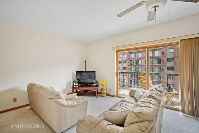 1653 River St Unit 405, Des Plaines, IL 60016 - carpeted living room featuring baseboards and a ceiling fan