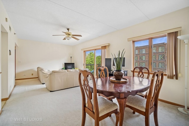 1653 River St Unit 405, Des Plaines, IL 60016 - dining room featuring light colored carpet, ceiling fan, and baseboards