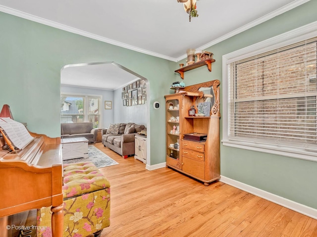 4154 Elm Ave, Brookfield, IL 60513 - living room featuring arched walkways, wood finished floors, and ornamental molding