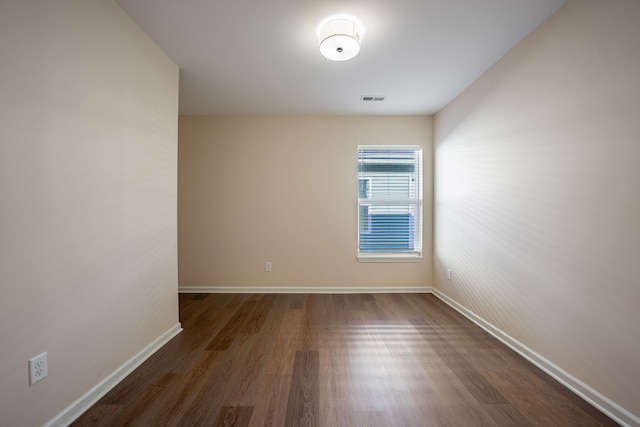 896 Fuller Ln, Belvidere, IL 61008 - spare room with wood finished floors and baseboards