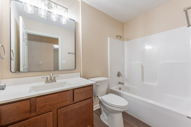 896 Fuller Ln, Belvidere, IL 61008 - full bath with toilet, wood finished floors, shower / bathtub combination, and vanity
