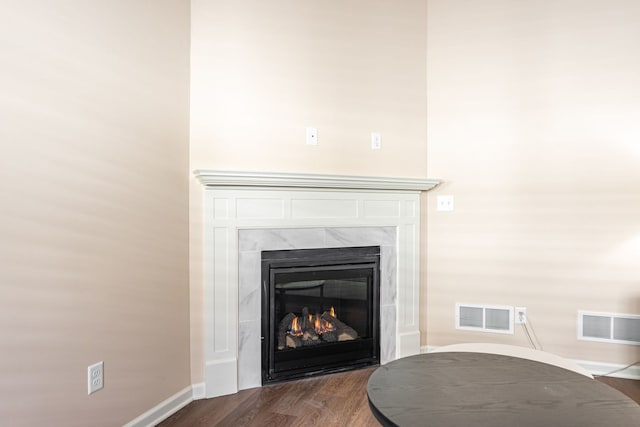 896 Fuller Ln, Belvidere, IL 61008 - detailed view of a premium fireplace, baseboards, and wood finished floors