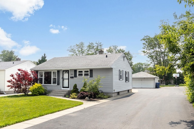 814 S Harvard Ave, Villa Park, IL 60181 - view of front of house with an outbuilding, a garage, a front yard, a chimney, and a shingled roof
