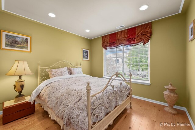 5611 Wildspring Dr, Lake In The Hills, IL 60156 - bedroom with baseboards, wood finished floors, and recessed lighting