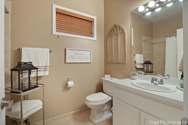 3334 N Odell Ave, Chicago, IL 60634 - full bathroom featuring tile patterned flooring, toilet, vanity, curtained shower, and baseboards