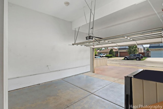 3334 N Odell Ave, Chicago, IL 60634 - garage featuring a garage door opener