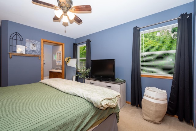 6809 Normandy Dr, Spring Grove, IL 60081 - bedroom with light carpet, multiple windows, ceiling fan, and baseboards