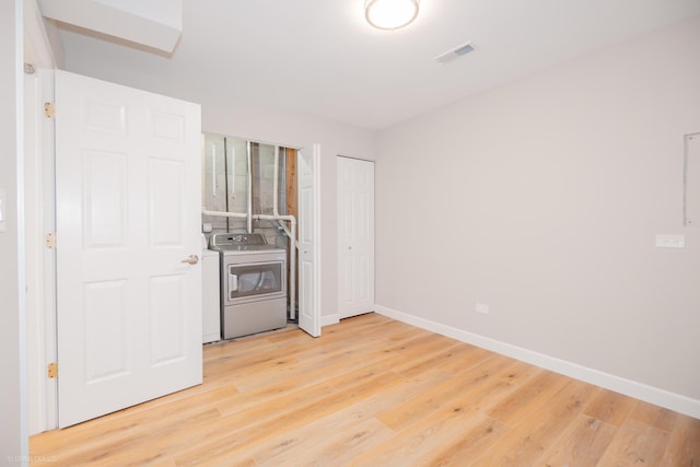 1537 N Clybourn Ave Unit D, Chicago, IL 60610 - unfurnished bedroom featuring light wood finished floors and baseboards