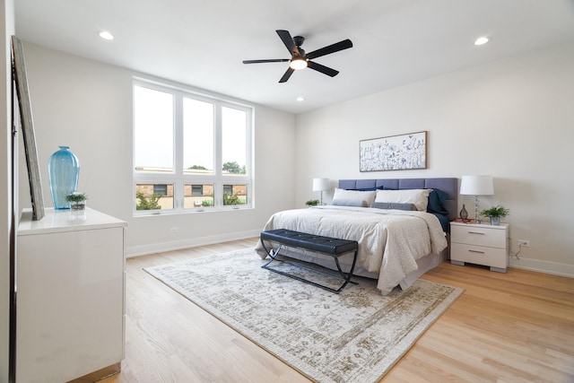 3450 N Central Ave, Chicago, IL 60634 - bedroom featuring baseboards, light wood-style flooring, recessed lighting, and a ceiling fan