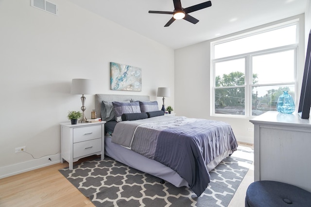 3450 N Central Ave, Chicago, IL 60634 - bedroom featuring light wood-style flooring, baseboards, and ceiling fan