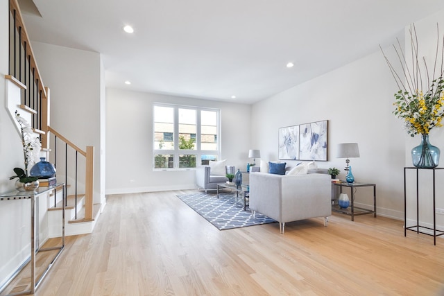 3450 N Central Ave, Chicago, IL 60634 - living area featuring stairway, light wood-style floors, recessed lighting, and baseboards