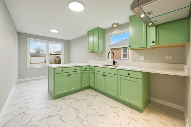 11724 S Loomis St, Chicago, IL 60643 - kitchen with a sink, light marble finish floors, green cabinets, baseboards, and extractor fan