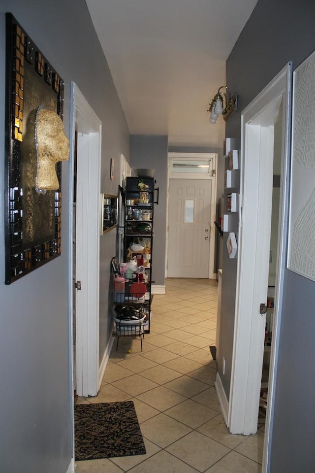 2102 Gunderson Ave, Berwyn, IL 60402 - corridor with light tile patterned floors and baseboards