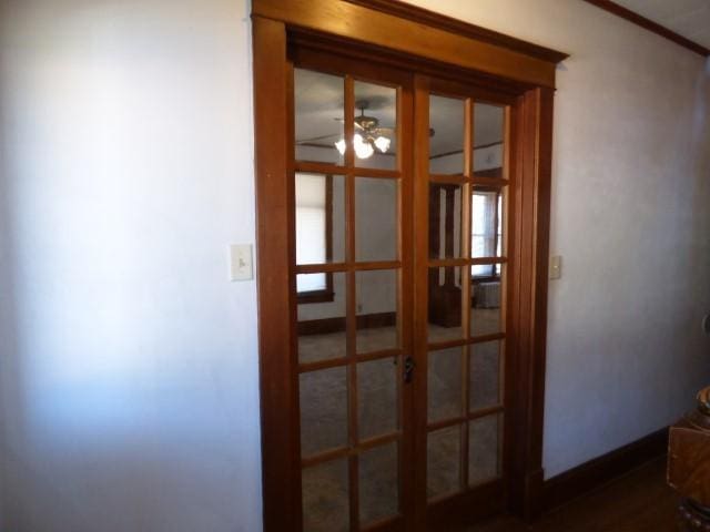 516 Spring St, Galena, IL 61036 - detailed view of french doors and a ceiling fan