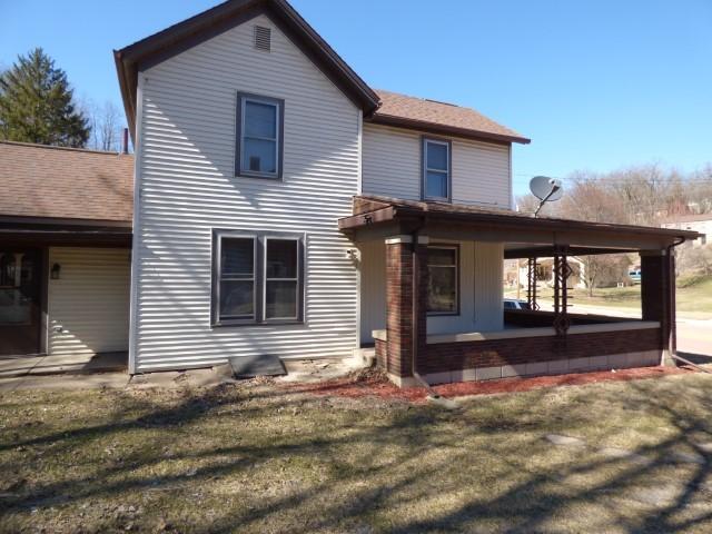 516 Spring St, Galena, IL 61036 - rear view of property featuring a yard and roof with shingles