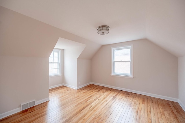 5651 N Osceola Ave, Chicago, IL 60631 - additional living space with hardwood / wood-style floors, lofted ceiling, and baseboards