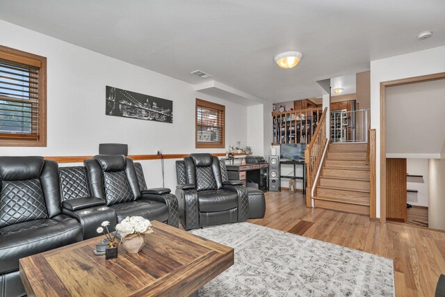 2111 Hastings Dr, Plainfield, IL 60586 - living area featuring wood finished floors and stairway