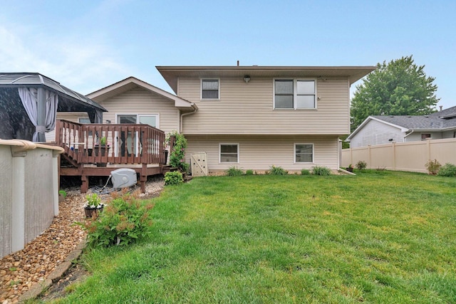 2111 Hastings Dr, Plainfield, IL 60586 - rear view of house featuring a wooden deck
