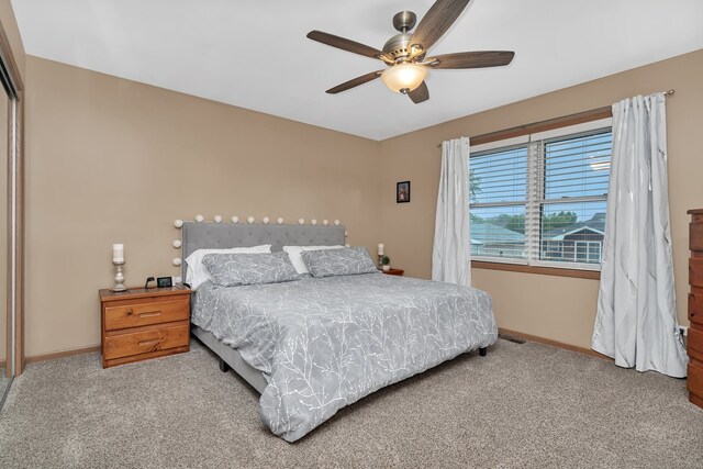 2111 Hastings Dr, Plainfield, IL 60586 - carpeted bedroom with baseboards and ceiling fan