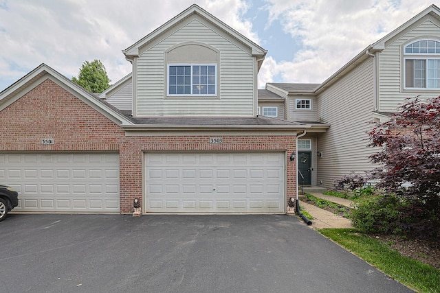 3503 Blue Ridge Ct, Carpentersville, IL 60110 - view of front of property featuring brick siding, driveway, and a garage