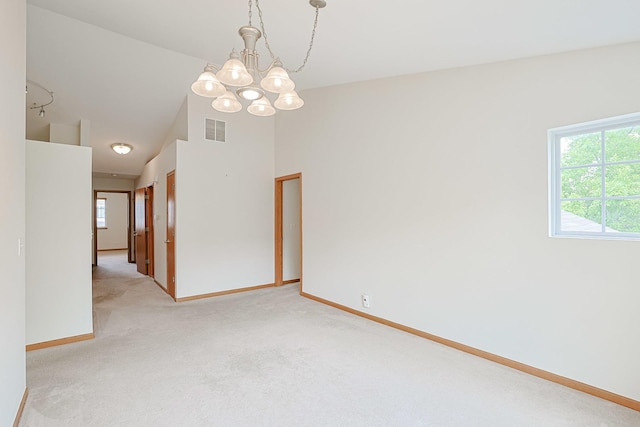3503 Blue Ridge Ct, Carpentersville, IL 60110 - carpeted spare room featuring plenty of natural light, a chandelier, and high vaulted ceiling