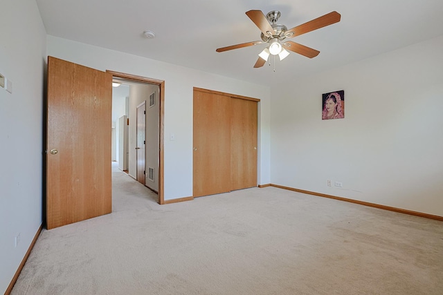 3503 Blue Ridge Ct, Carpentersville, IL 60110 - unfurnished bedroom featuring light carpet, a closet, and ceiling fan