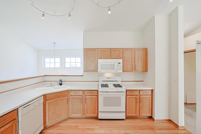 3503 Blue Ridge Ct, Carpentersville, IL 60110 - kitchen with white appliances, light wood-style flooring, light countertops, and light brown cabinets