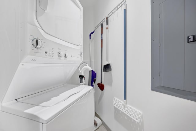 65 E Monroe St Unit 4203, Chicago, IL 60603 - laundry area featuring estacked washer and dryer and electric panel