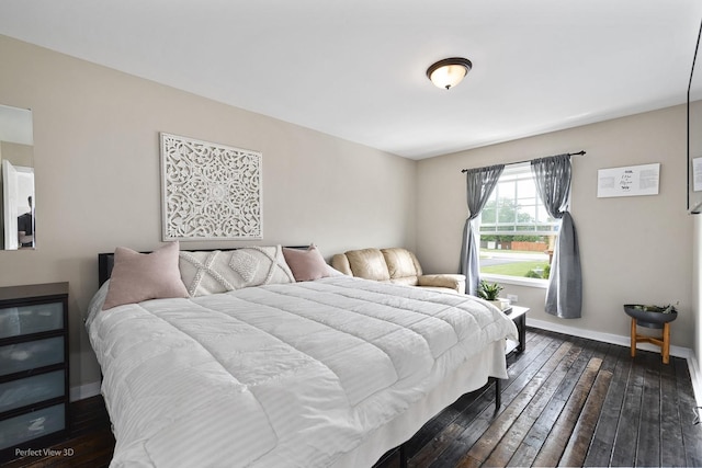 7612 W Saint Francis Rd Unit 7612, Frankfort, IL 60423 - bedroom with dark wood-type flooring and baseboards