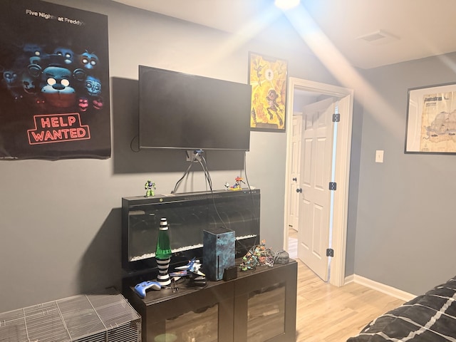 7612 W Saint Francis Rd Unit 7612, Frankfort, IL 60423 - bedroom featuring wood finished floors and baseboards