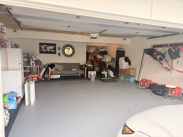 7612 W Saint Francis Rd Unit 7612, Frankfort, IL 60423 - garage featuring a garage door opener