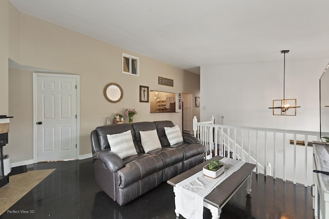 7612 W Saint Francis Rd Unit 7612, Frankfort, IL 60423 - living room featuring a chandelier and baseboards