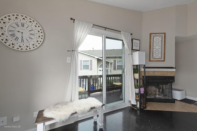 7612 W Saint Francis Rd Unit 7612, Frankfort, IL 60423 - doorway to outside featuring baseboards, wood finished floors, and a tiled fireplace