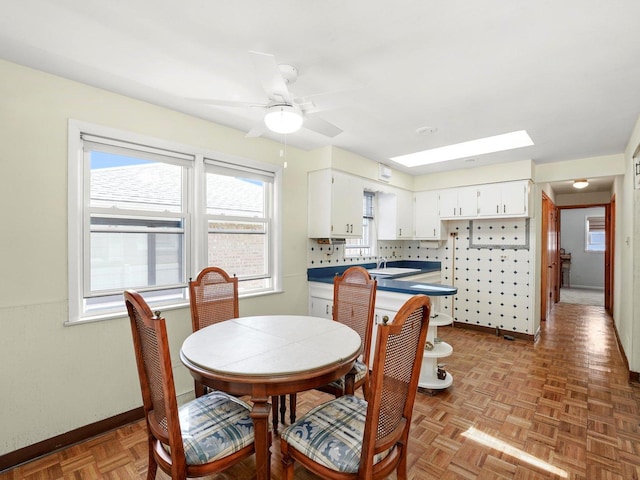 10324 S Sacramento Ave, Chicago, IL 60655 - dining area featuring ceiling fan and a skylight