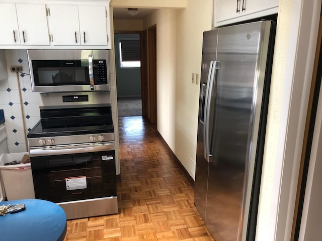 10324 S Sacramento Ave, Chicago, IL 60655 - kitchen with appliances with stainless steel finishes and white cabinetry