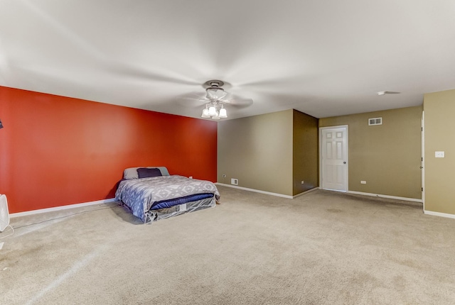 1715 Ivy Ln, Montgomery, IL 60538 - bedroom with carpet, baseboards, and ceiling fan