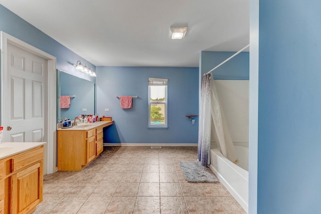 1715 Ivy Ln, Montgomery, IL 60538 - bathroom with vanity, shower / tub combo with curtain, and tile patterned floors