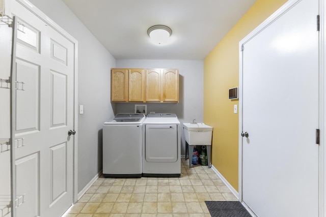 1715 Ivy Ln, Montgomery, IL 60538 - laundry room with washer and dryer, cabinet space, and baseboards
