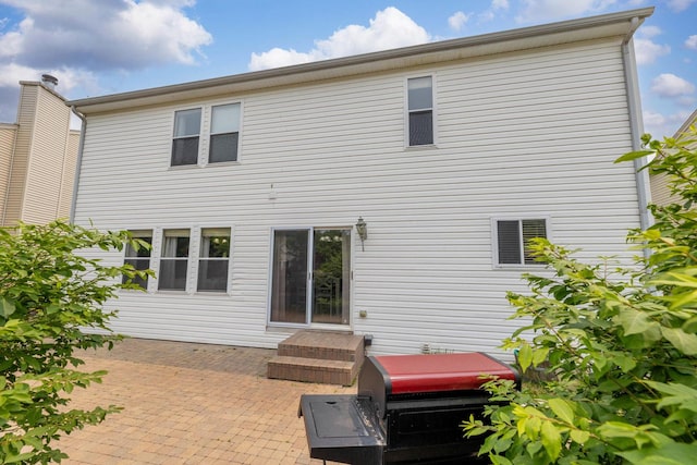 1715 Ivy Ln, Montgomery, IL 60538 - back of property with a patio area