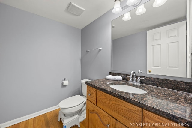1630 Lois Ann Ln, Naperville, IL 60563 - half bath featuring vanity and wood finished floors