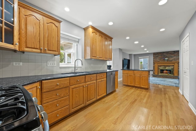 1630 Lois Ann Ln, Naperville, IL 60563 - kitchen with stainless steel dishwasher, range, light wood-type flooring, glass insert cabinets, and recessed lighting
