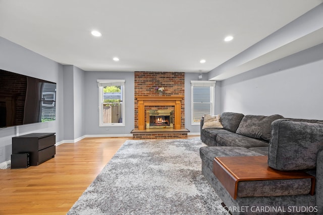 1630 Lois Ann Ln, Naperville, IL 60563 - living area with a brick fireplace, light wood-style floors, and recessed lighting