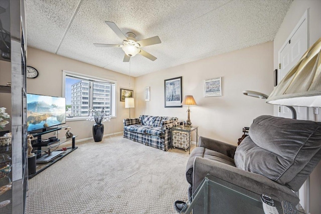 770 Pearson St Unit 604, Des Plaines, IL 60016 - living room featuring ceiling fan, carpet flooring, and baseboards