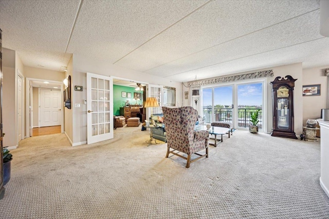770 Pearson St Unit 604, Des Plaines, IL 60016 - living area with carpet flooring, french doors, and a textured ceiling