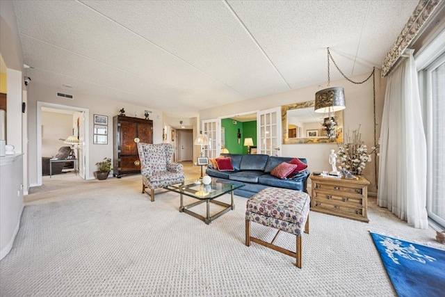 770 Pearson St Unit 604, Des Plaines, IL 60016 - carpeted living area with french doors and a textured ceiling