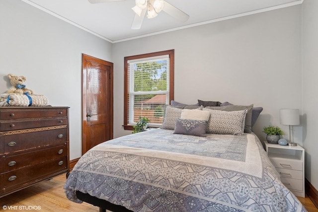 420 Blackhawk Dr, Westmont, IL 60559 - bedroom featuring light wood finished floors, ornamental molding, baseboards, and ceiling fan