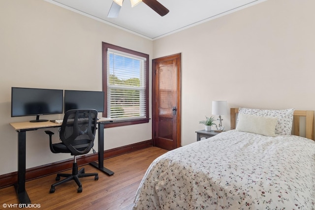 420 Blackhawk Dr, Westmont, IL 60559 - bedroom featuring wood finished floors, ornamental molding, baseboards, a desk, and a ceiling fan