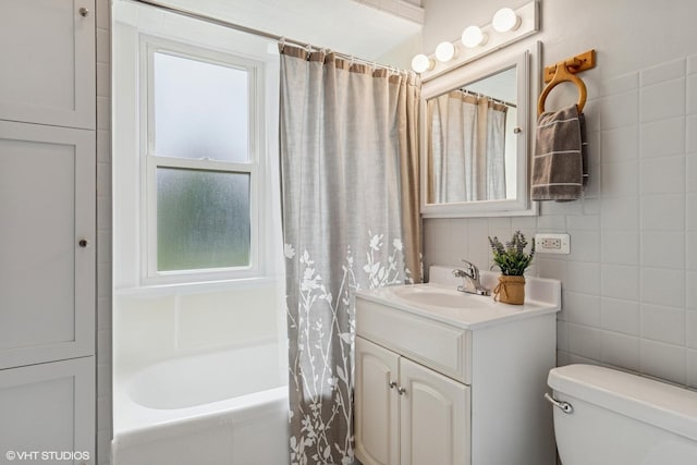 420 Blackhawk Dr, Westmont, IL 60559 - full bath with vanity, plenty of natural light, shower / bath combination with curtain, toilet, and tile walls